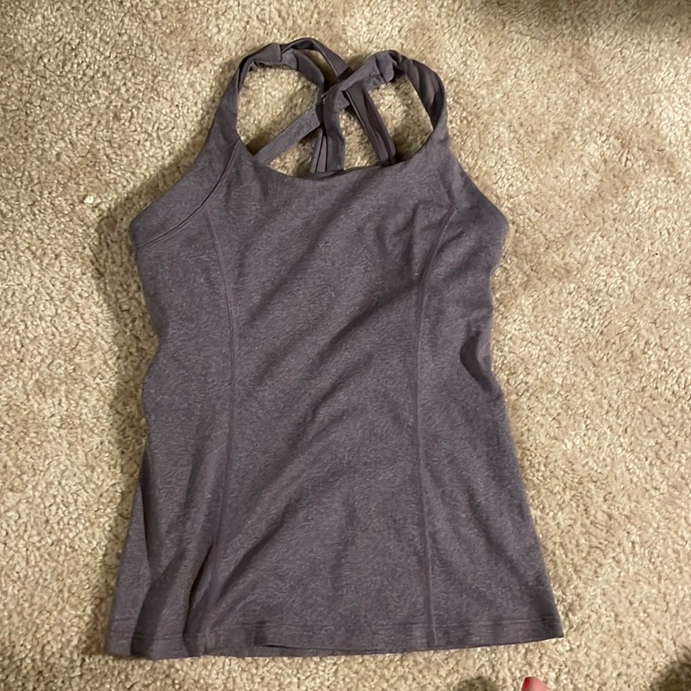 Lululemon tank top with built in sports bra. Color is heathered deep purple.